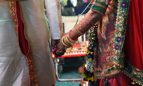 Indian couple taking part in a wedding