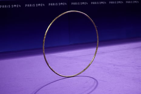 A hoop belonging to rhythmic gymnast Polina Berezina of Spain is pictured as it glides off stage at the Porte de La Chapelle Arena.