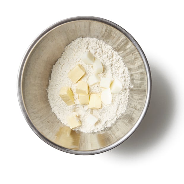 Combine cubes of lard and butter with flour and a pinch of salt.