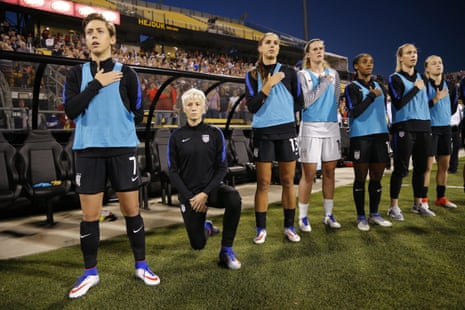 Megan Rapinoe kneels during the playing of the national anthem before the soccer match against Thailand last month.