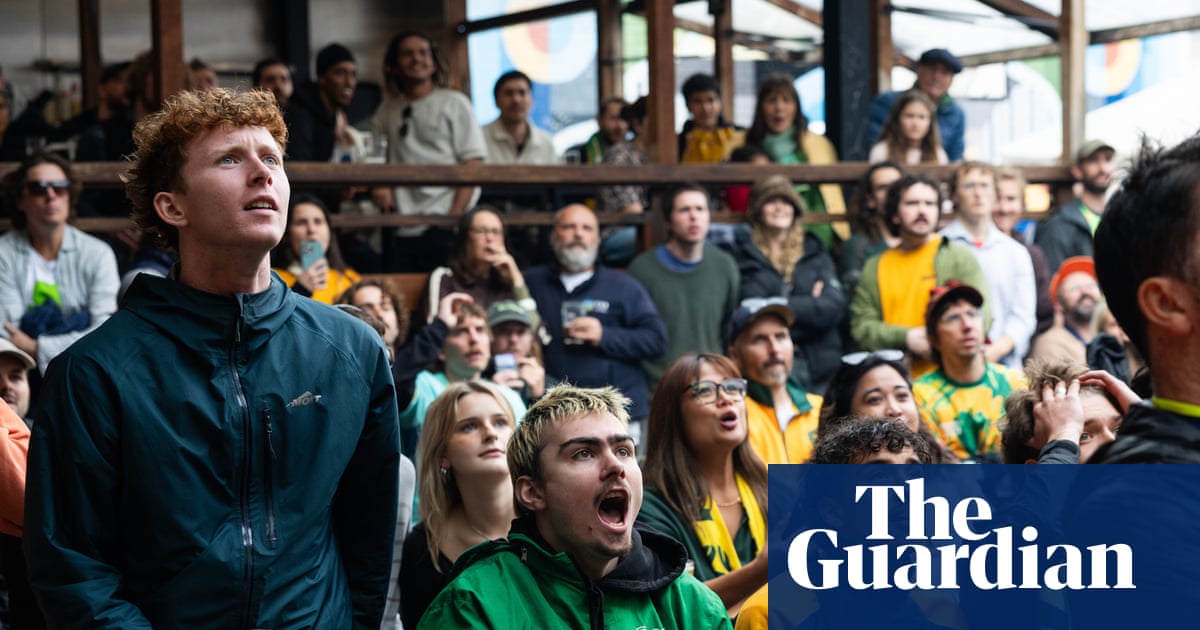 Packed pubs and skiving school: Australian fans nurse pints over laptops to cheer on Socceroos