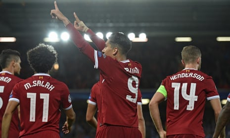 Liverpool’s Roberto Firmino celebrates his goal in the Champions League qualifying round second leg against Hoffenheim.