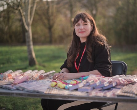 Annabel Lee with a table of goods for sale for Mother’s Day to raise money for the PTA at their children’s school in Bicester.
