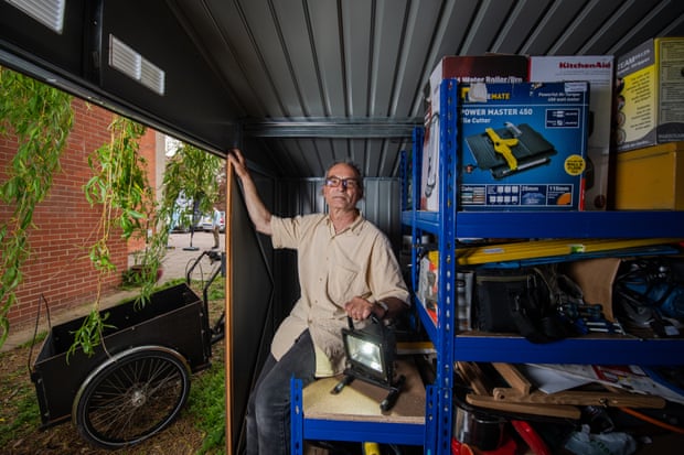 Henson in his storage shed