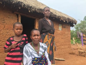 Rahel Charles Rosana, centre, with her mother and daughter at their home outside the village of Misasi.