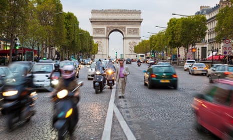 The Avenue des Champs-Elysees in front of the Arc de Triomphe in Paris. The road will be closed to vehicles one Sunday a month to combat pollution.
