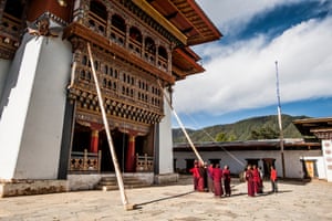 Monks erect supports to carry out maintenance work at Gangtey Goempa Monastery, Phobjikha Valley