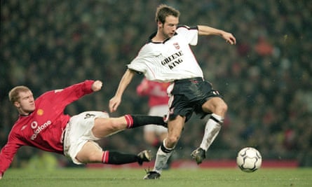 Marcus Stewart breaks away from Paul Scholes during Ipswich’s game at Manchester United in December 2000.