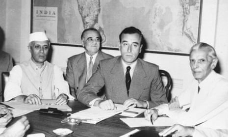 Lord Mountbatten and Indian leaders sign documents to agree upon the partition of India in 1947.