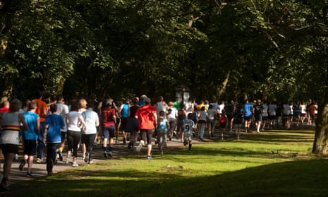 Participants in a 5km Parkrun around Hyde Park in Leeds in March 2020.