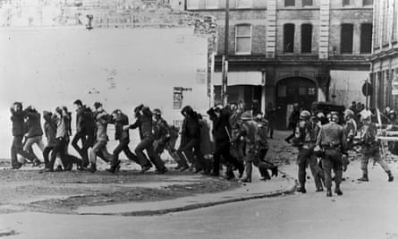 British paratroopers take away civil rights demonstrators on Bloody Sunday.