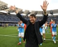 Antonio Conte waves to fans, alongside his players, after Napoli’s win over Udinese