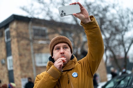 person wearing yellow jacket