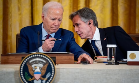 Men sit at table