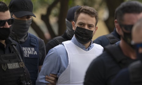 Babis Anagnostopoulos wore a bulletproof vest to court in Athens.