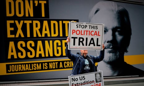 A demonstrator protests outside the Old Bailey in central London on the second day of Julian Assange’s extradition hearing. 