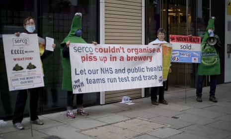 Protesters take part in a demonstration outside the Department of Health and Social Care over Serco’s handling of the test, track and trace system.