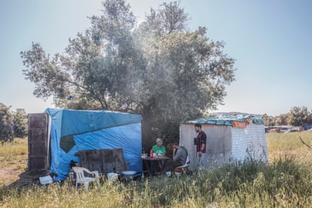 Mawlod Hassan and Daud outside an informal shelter in the migrant worker camp, Cassibile, Sicily.
