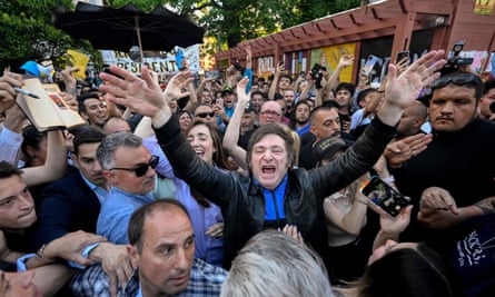 milei surrounded by supporters