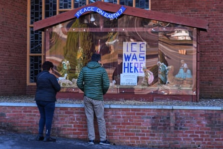 people look at a nativity scene that features a scene that reads ‘ice was here’