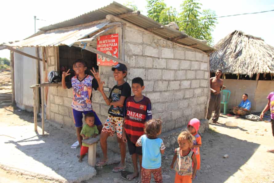 A Timor-Leste family in Oecusse, the site of a large scale government infrastructure-building program.