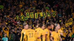 Australia fans celebrate a deserved victory.