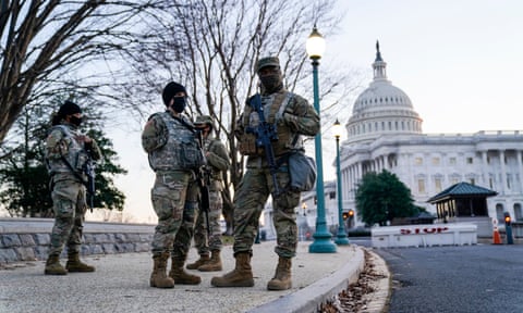 National Guard troops stand outside the US Capitol