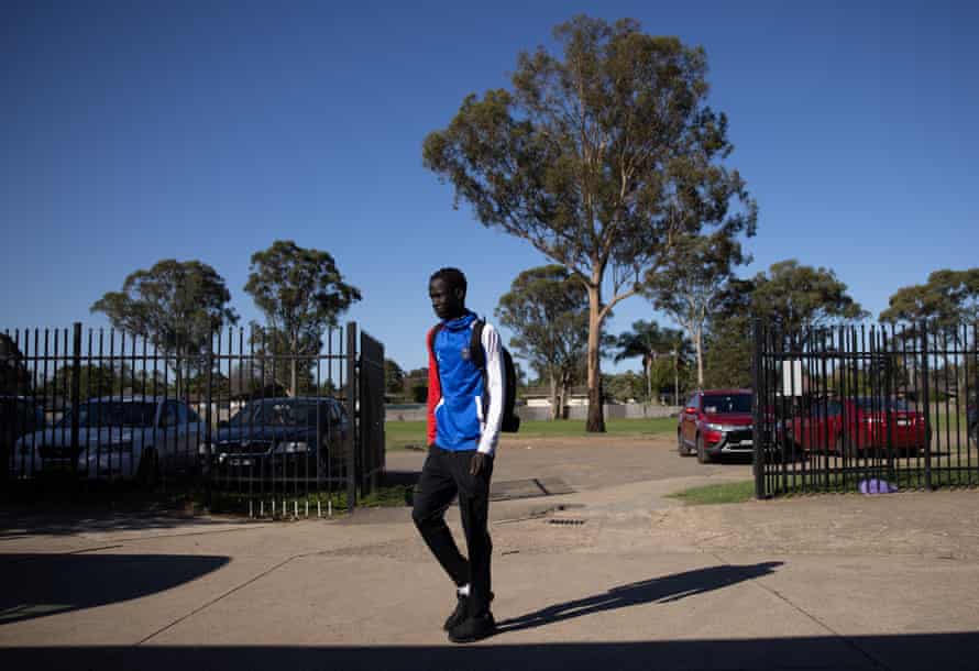 Lueth Awan arrives for training.