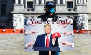 This person made their leanings very clear as they held a ‘You’re Fired’ sign with Donald Trump’s face on it, echoing his famous reality TV phrase, while describing his loss of the presidency. The man was at an Inauguration Day event in Harrisburg, Pennsylvania, on Wednesday.