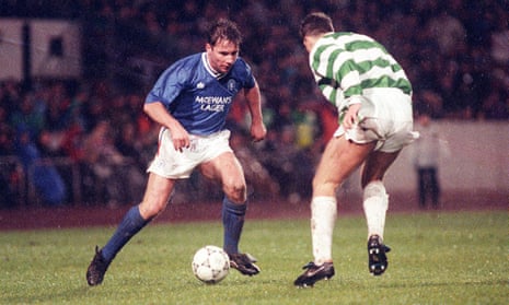 Ally McCoist tries to beat Derek Whyte during the Scottish Cup semi-final between Rangers and Cectic in 1992.