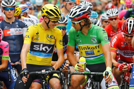 Chris Froome , the race yellow jersey leader, talks with Tinkoff-Saxo rider Peter Sagan before the start of the 14th stage.
