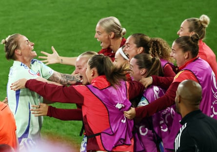 Jessica Fishlock celebrates with teammates after scoring Wales’ first goal at a major tournament in their Euro 2025 match against France.