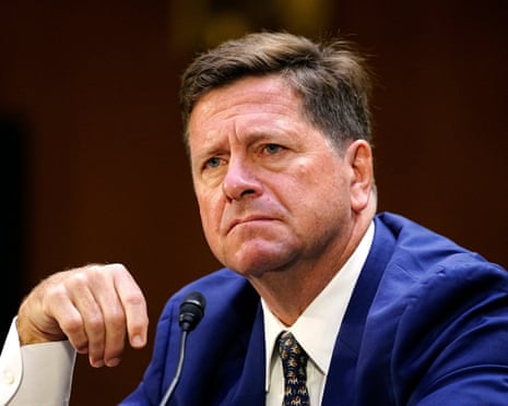 Jay Clayton sitting at a desk as he speaks in a Senate nomination hearing in Washington DC