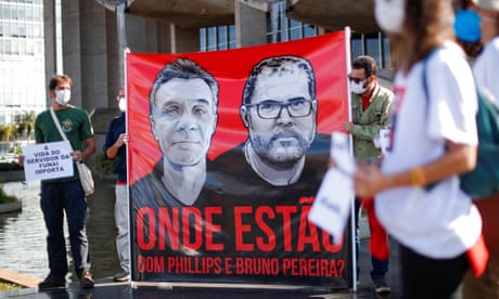 Missing poster for Dom Phillips and Bruno Pereira (Photograph: Adriano Machado/Reuters)