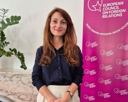 Maria Simeonova standing next to a banner for the European Council on Foreign Relations