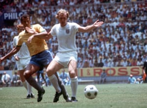 Bobby Moore shields the ball from Brazil’s Carlos Alberto