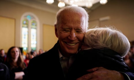 A truly rare politician … Biden hugs a supporter at a campaign event in New Hampshire in February 2020.