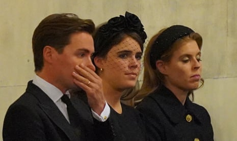 Princess Eugenie, Princess Beatrice, and her husband Edoardo Mapelli Mozzi look on as the vigil takes place.