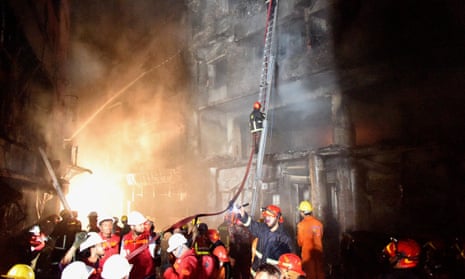 Massive Fire Broke In Dhaka, Bangladesh<br>(190221) -- DHAKA, Feb. 21, 2019 (Xinhua) -- Rescuers work at a fire site in Dhaka, Bangladesh, Feb. 21, 2019. At least 40 people were killed and scores injured in a fire that ripped through a building in Bangladesh capital Dhaka Wednesday night, local media reported. The fire broke out at around 10 p.m. local time at a building in old Dhaka. The flames then quickly spread to other buildings nearby, said a local fire service official. (Xinhua/Salim Reza)