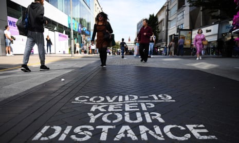 A Covid-19 social distancing public notice on a street in Birmingham, Britain, 13 September 2020.