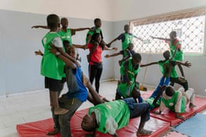 Adji Mbene Lam, 29, acrobat and head of social projects for Sencirk, gives acrobatics classes to street children in Dakar.