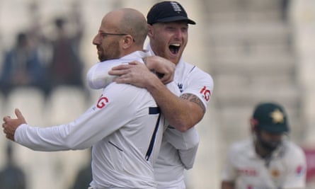 Jack Leach is congratulated by Ben Stokes after taking the wicket of Muhammad Rizwan in the second Test.