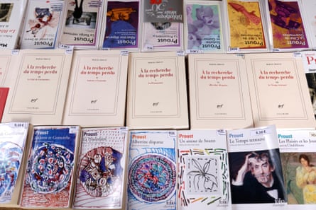 Multiple novels by French author Marcel Proust including his magnum opus ‘A la recherche du temps perdu’ (In Search of Lost Time) laid out on a table
