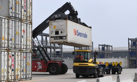 Containers are loaded on to trucks at Dover port in England