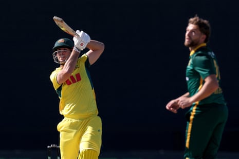 Mitch Marsh cracks another six off the bowling of Wiaan Mulder.