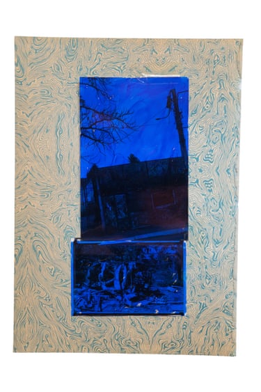 A collage on swirled patterned paper shows a blue-toned street scene above a dark abstract painted panel