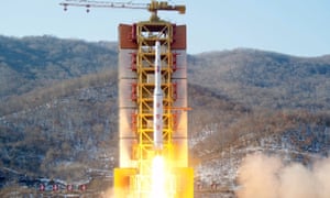 A North Korean long-range rocket is launched into the air at the Sohae rocket launch site