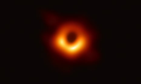 The first photograph of a black hole and its fiery halo, released by Event Horizon Telescope astronomers in 2019.