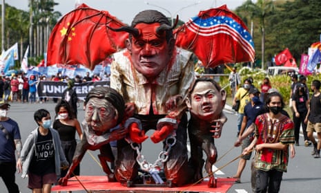Protesters tow an effigy of President Rodrigo Duterte in Manila, Philippines.