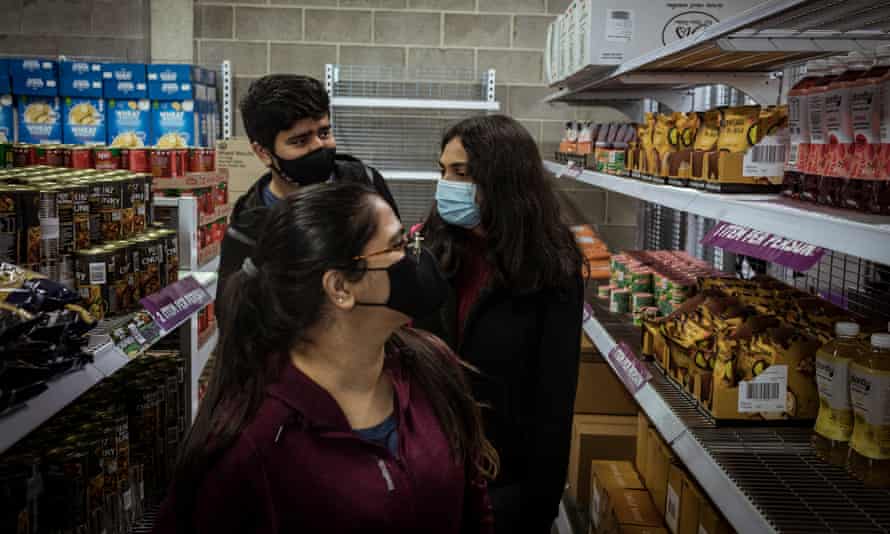 Kush Chandarana, Meghna Ganesh and Kanishka Chaudhray pick up groceries at Foodbank